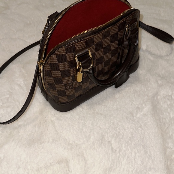 Louis Vuitton Alma Bb less than 2 years old with minor wear and tear - Picture 3 of 4